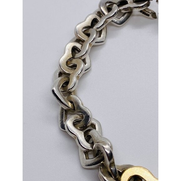 Tiffany & Co. Heart Link Bracelet in 18k Yellow Gold  Tiffany & Co. Vintage Heart Link Bracelet In Sterling Silver & 18K Yellow Gold